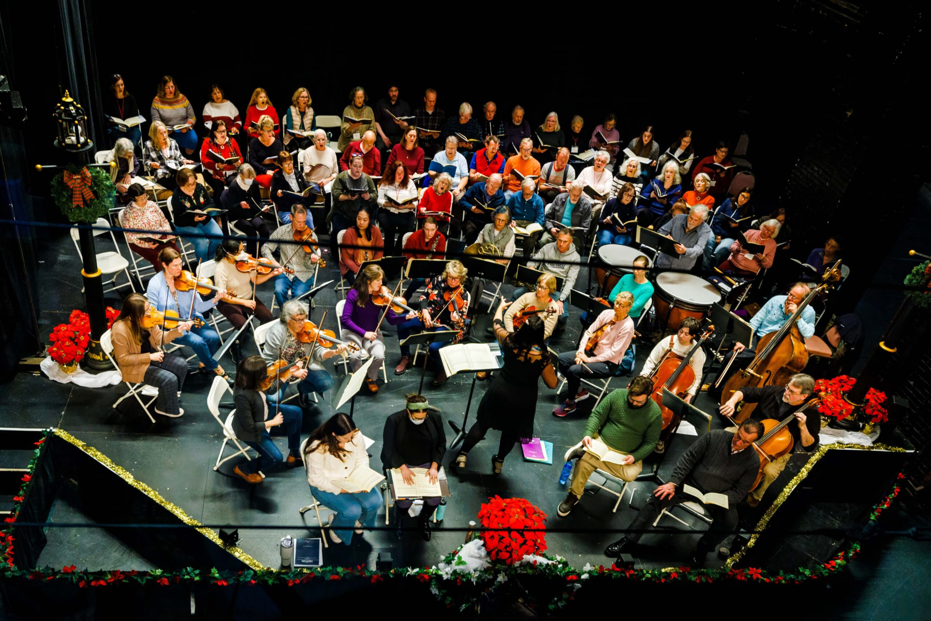 Chorus and orchestra from above during a holiday dress rehearsal